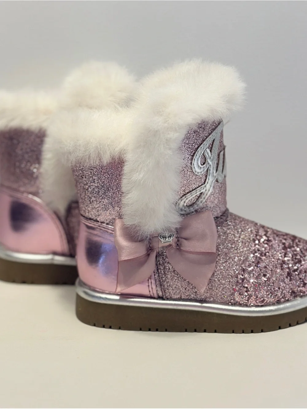 Juicy Couture Sparkle Pink Faux-Fur Bow Boots for toddler girls. Size 6M.